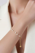 Pulsera perlas blancas